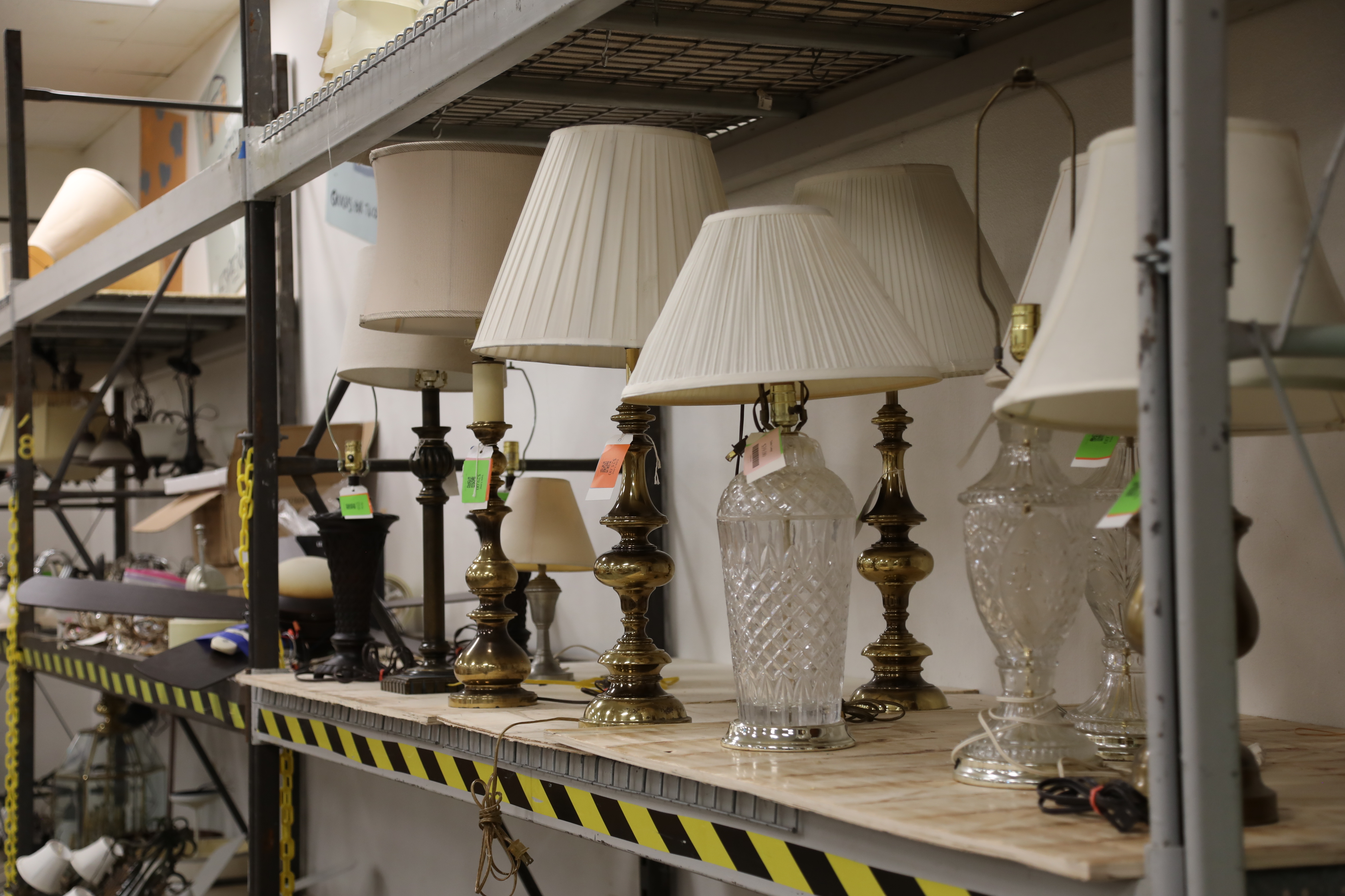 pre-loved lamps on the shelf at the ReStore
