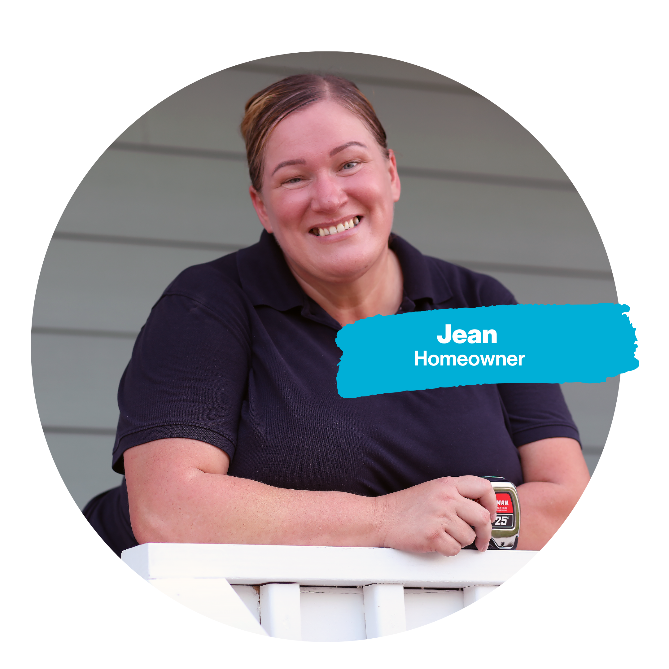 Jean standing on the porch of her home, holding a tape measure