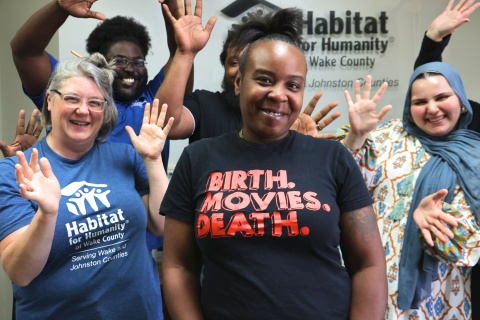 Kandy cheered on by Habitat Wake staff
